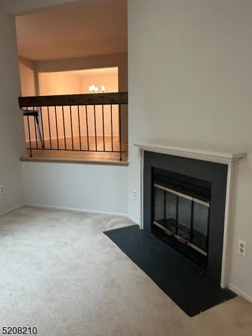 a living room with a fireplace