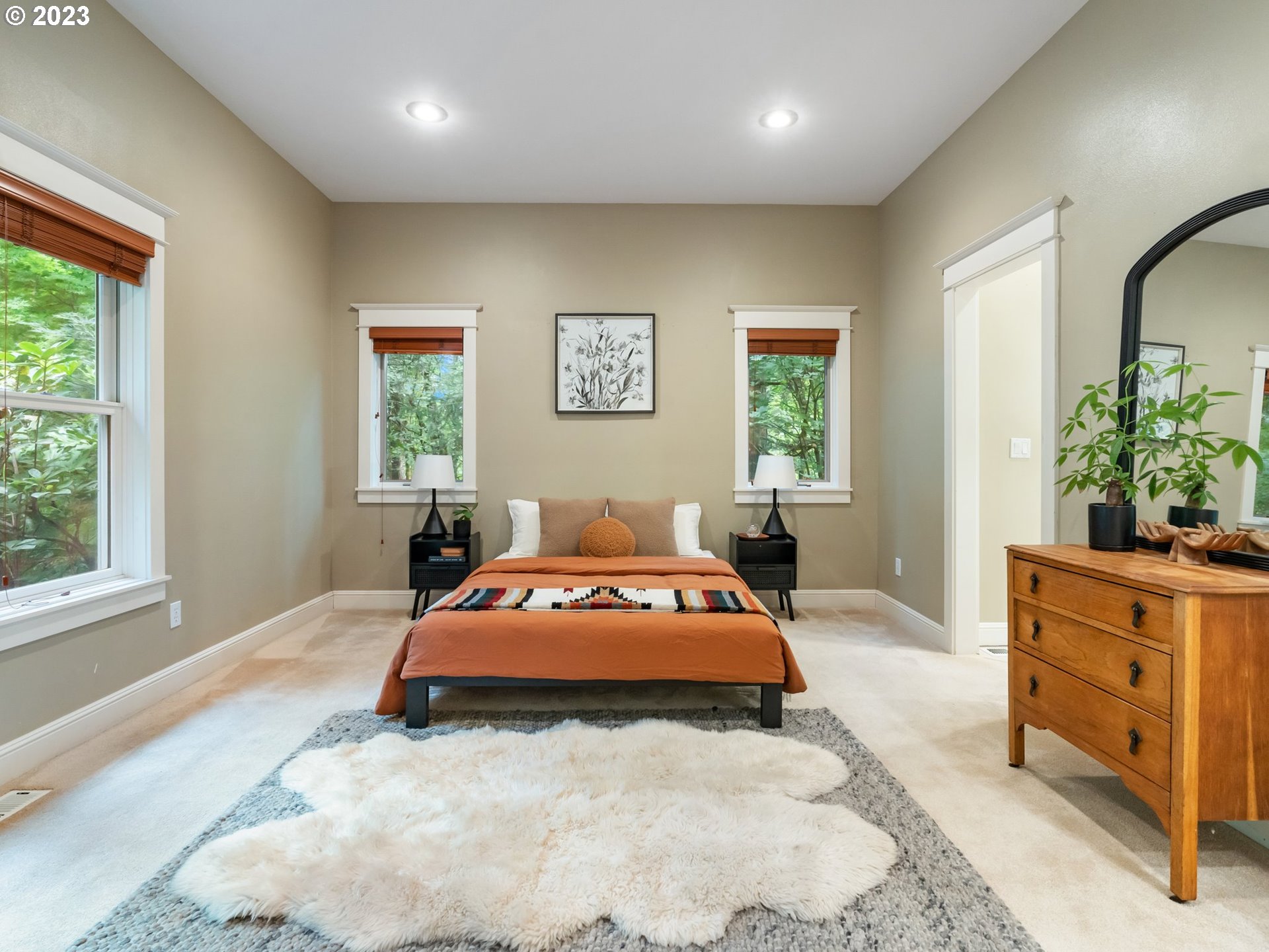 4410 West Burnside Road Portland, OR 97210 - Photo 16 of 42 a bedroom with a bed and window