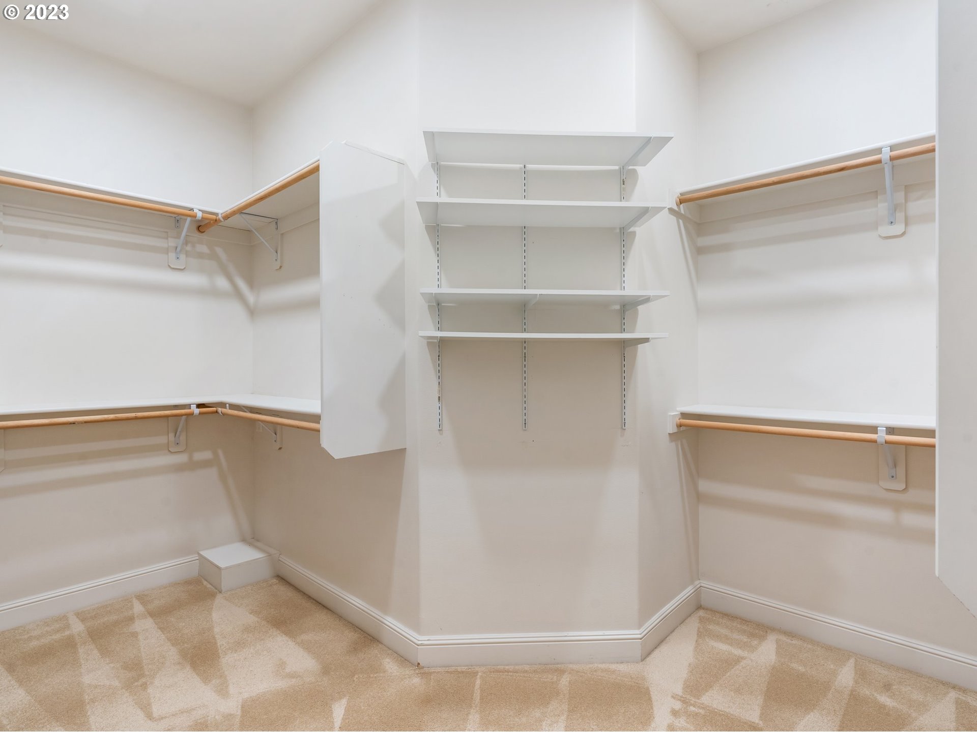 4410 West Burnside Road Portland, OR 97210 - Photo 19 of 42 a view of walk in closet with empty racks