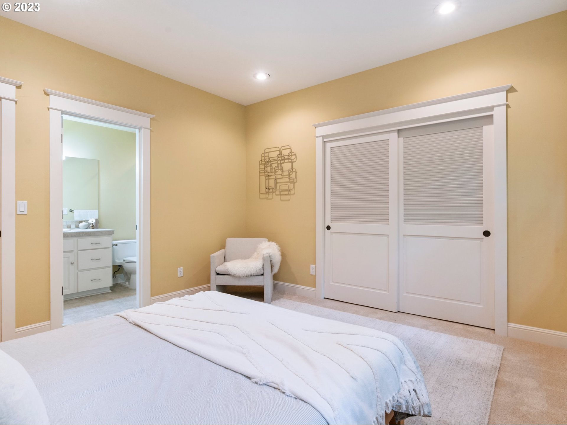 4410 West Burnside Road Portland, OR 97210 - Photo 24 of 42 a bedroom with a bed and a bathroom