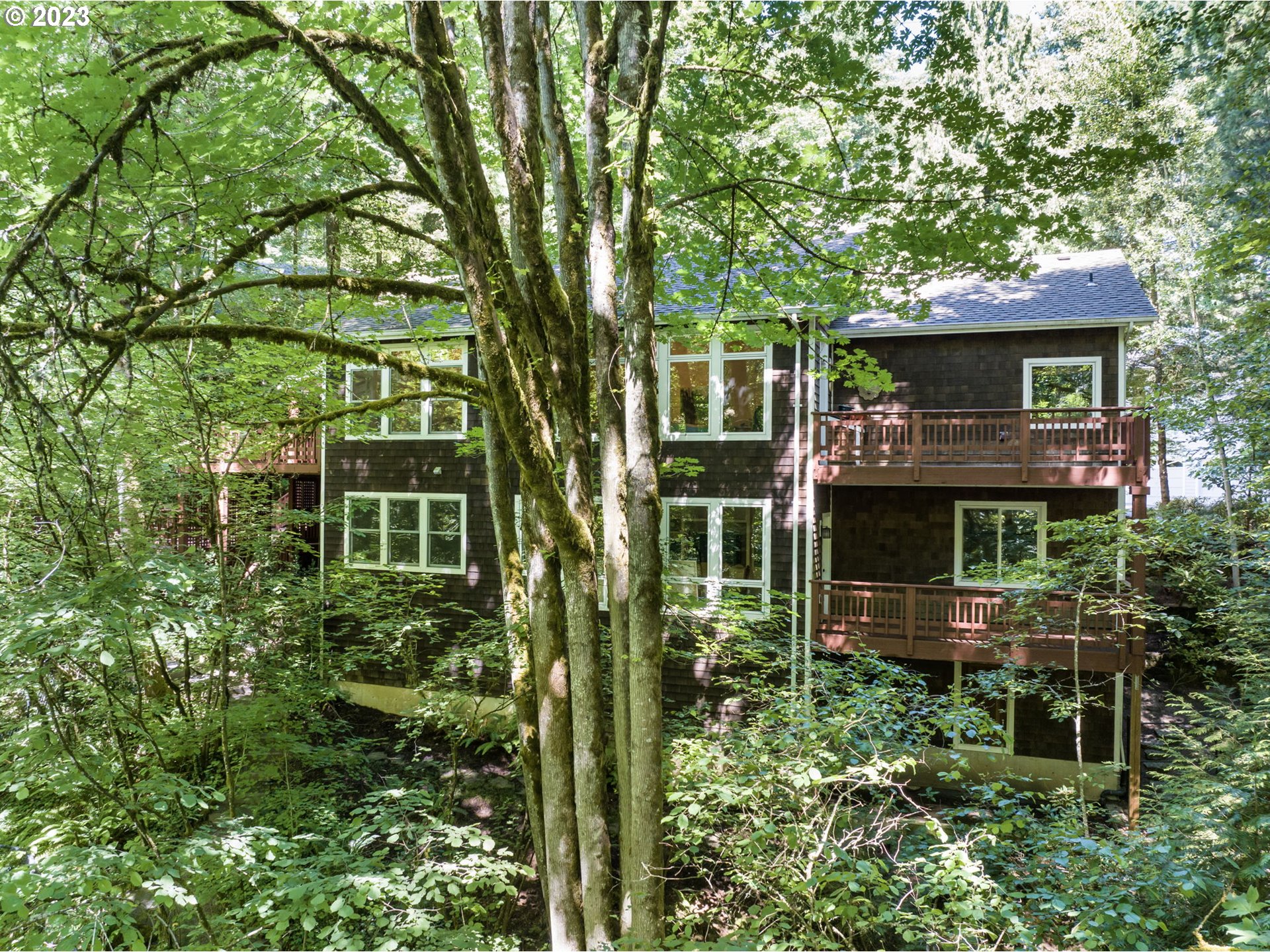 4410 West Burnside Road Portland, OR 97210 - Photo 36 of 42 front view of a house with a tree