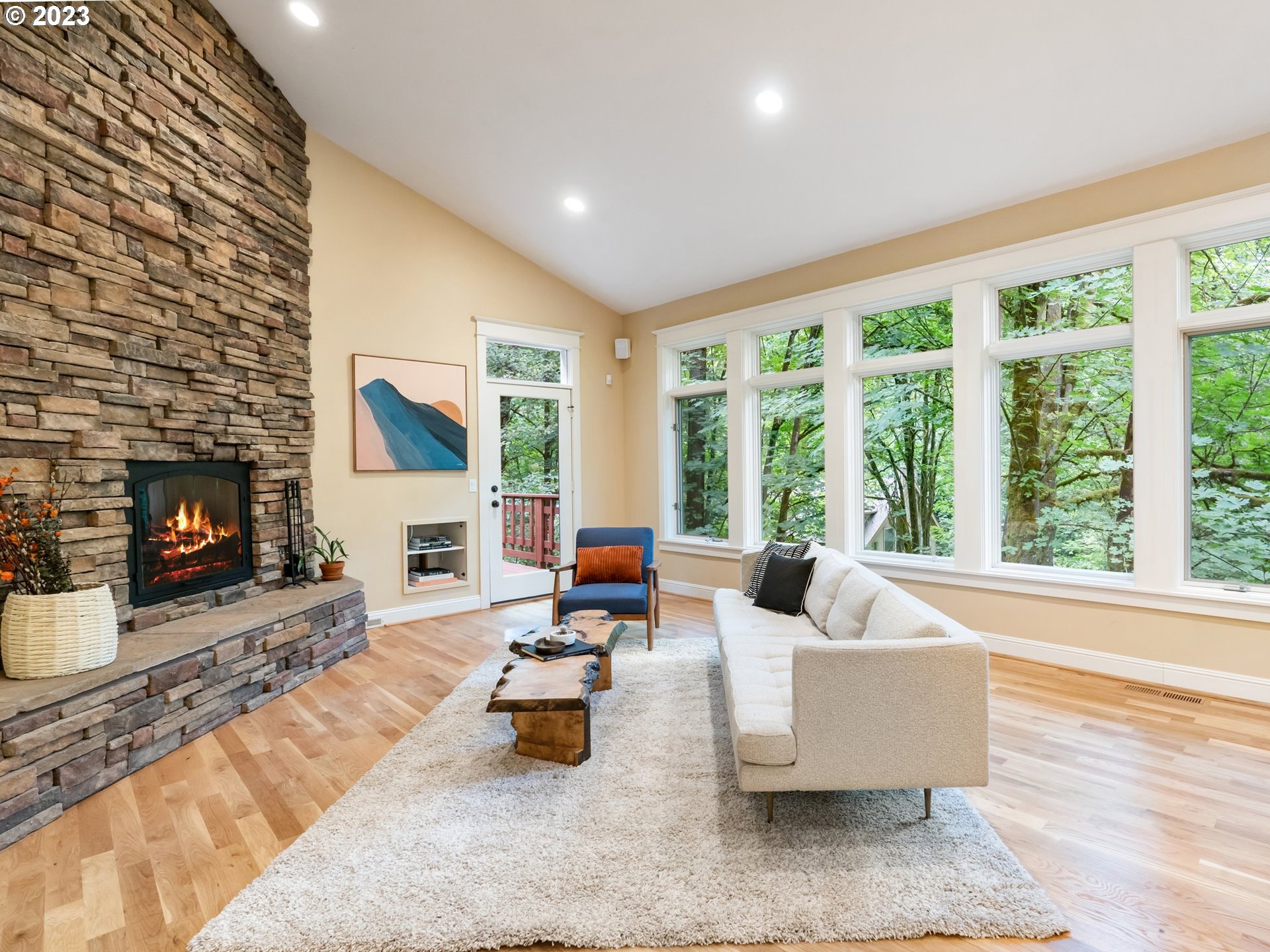 4410 West Burnside Road Portland, OR 97210 - Photo 6 of 42 a living room with furniture and a fireplace