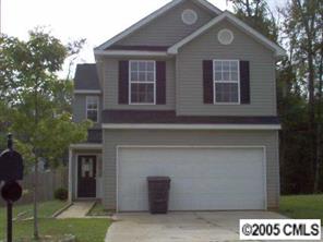2306 Eargle Road Charlotte, NC 28269 - Photo 1 of 1 a front view of a house with garden