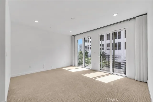 en empty room with windows