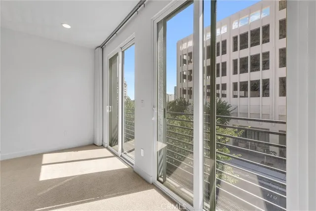 a view of a room with a large window