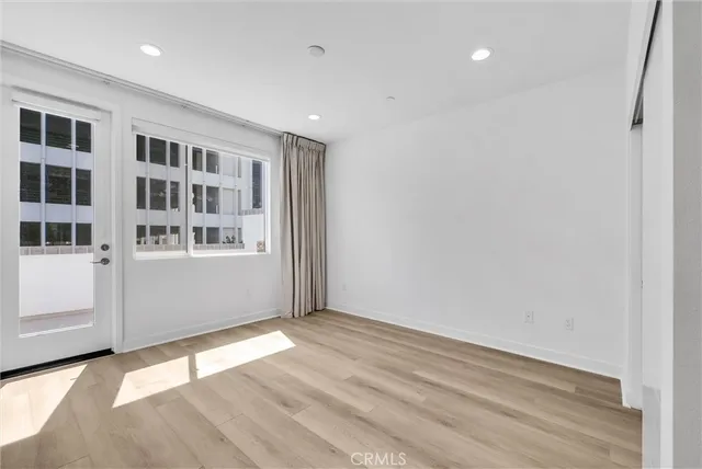 a view of empty room with windows