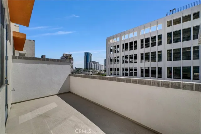 a view of a building from a balcony