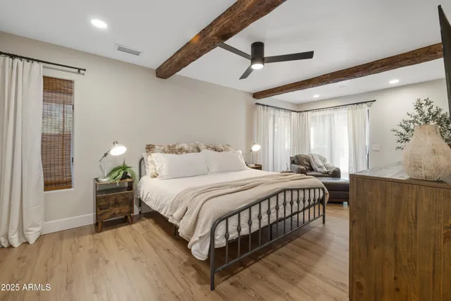 a bathroom with a bathtub and shower