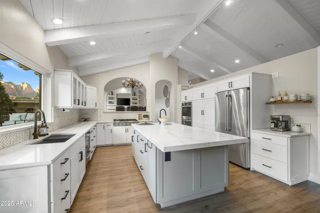 a living room with furniture fireplace and flat screen tv