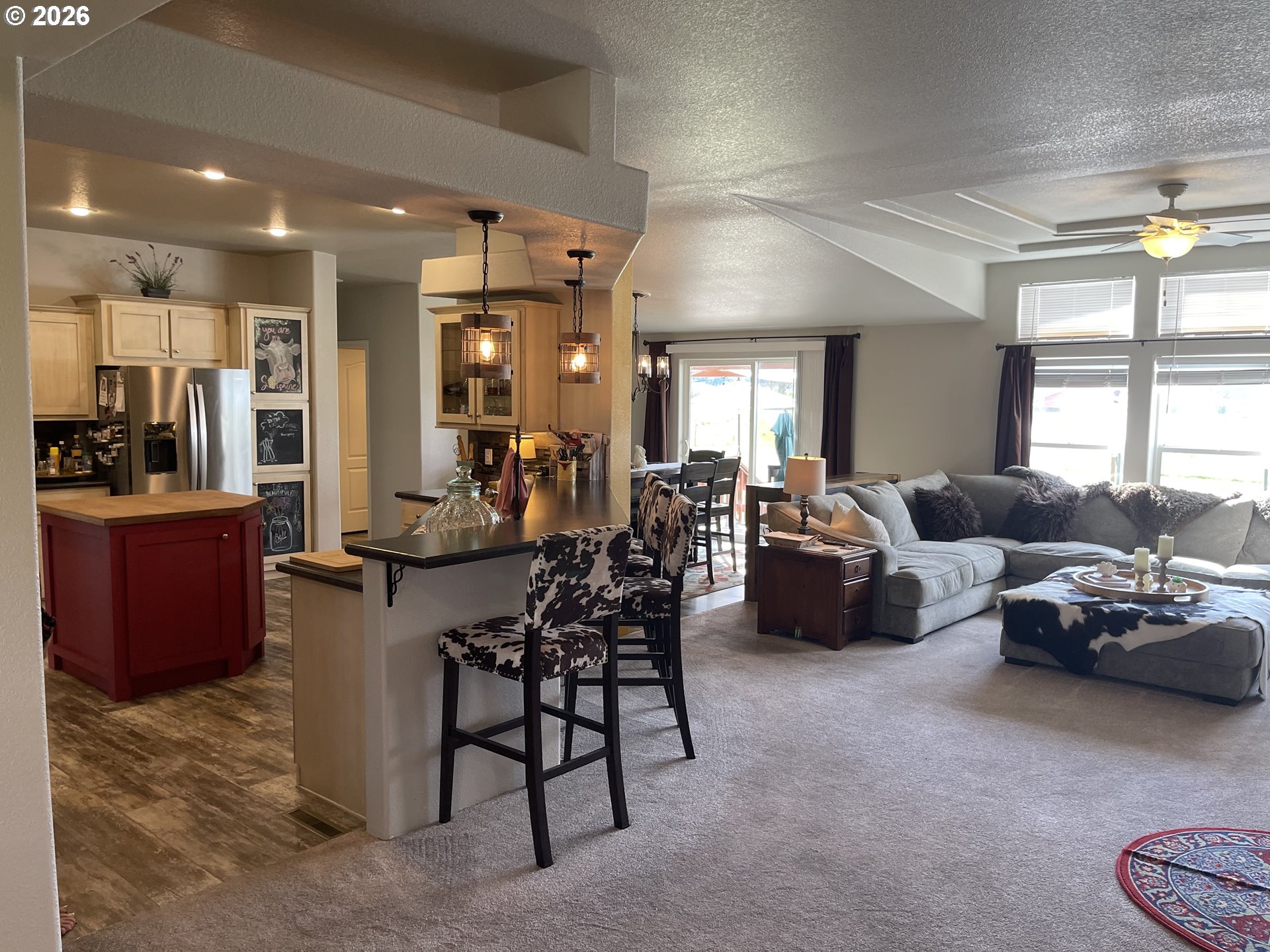 6404 Lookingglass Road Roseburg, OR 97471 - Photo 11 of 48 a living room with furniture and a large window