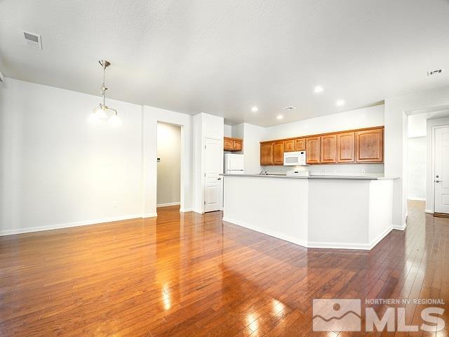 1298 Meridian Ranch Drive Reno, NV 89523 - Photo 9 of 19 a view of kitchen with wooden floor