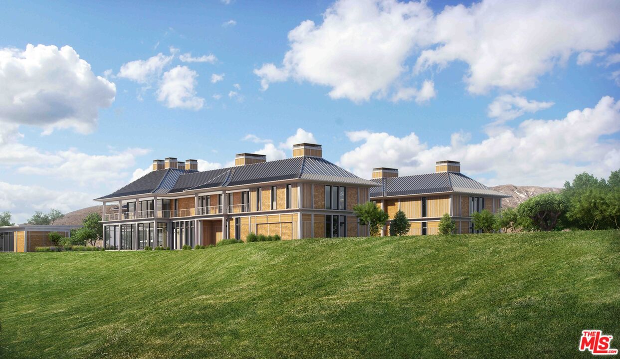 15101 Middle Ranch Road Moorpark, CA 93021 - Photo 22 of 28 a view of a house with a big yard and large trees