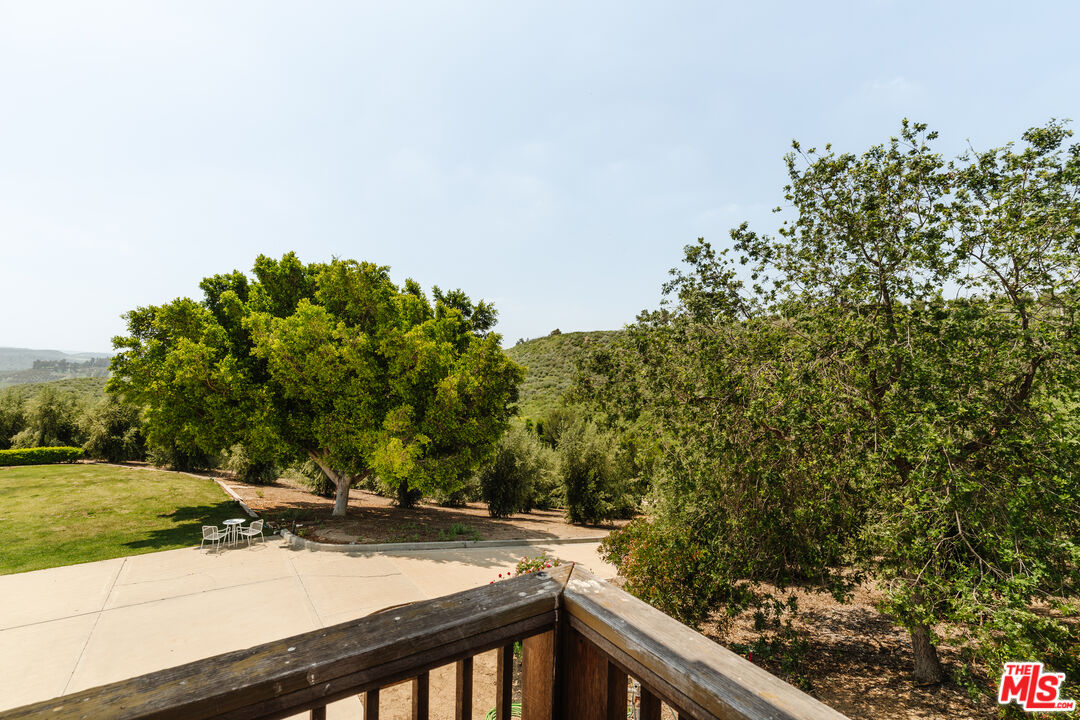 15101 Middle Ranch Road Moorpark, CA 93021 - Photo 5 of 28 a view of a street with a tree