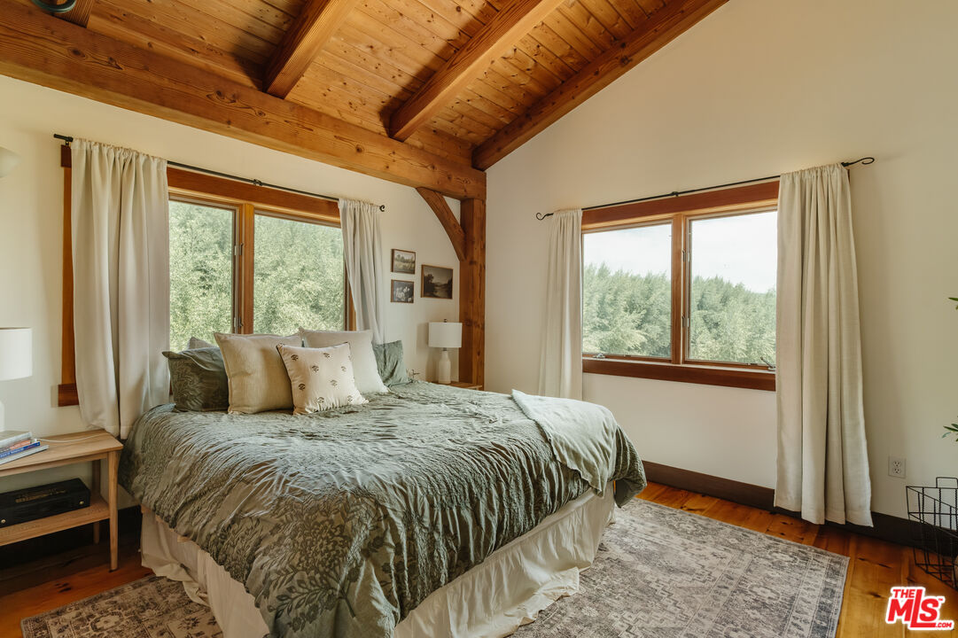 15101 Middle Ranch Road Moorpark, CA 93021 - Photo 9 of 28 a bed sitting in a bedroom next to a window