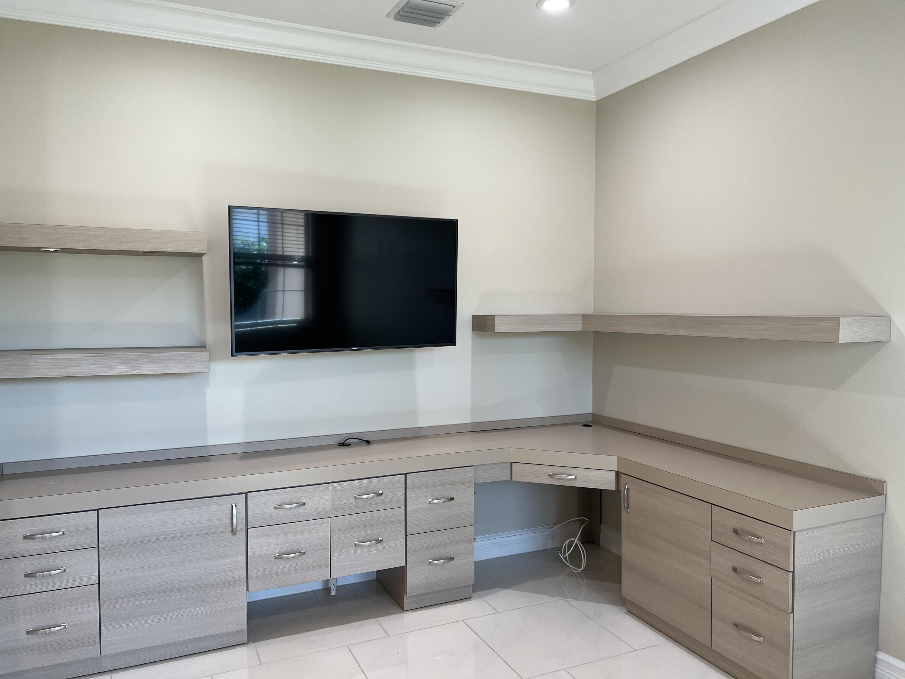 8375 Cloud Peak Drive Boynton Beach, FL 33473 - Photo 20 of 51 a room with cabinets and window