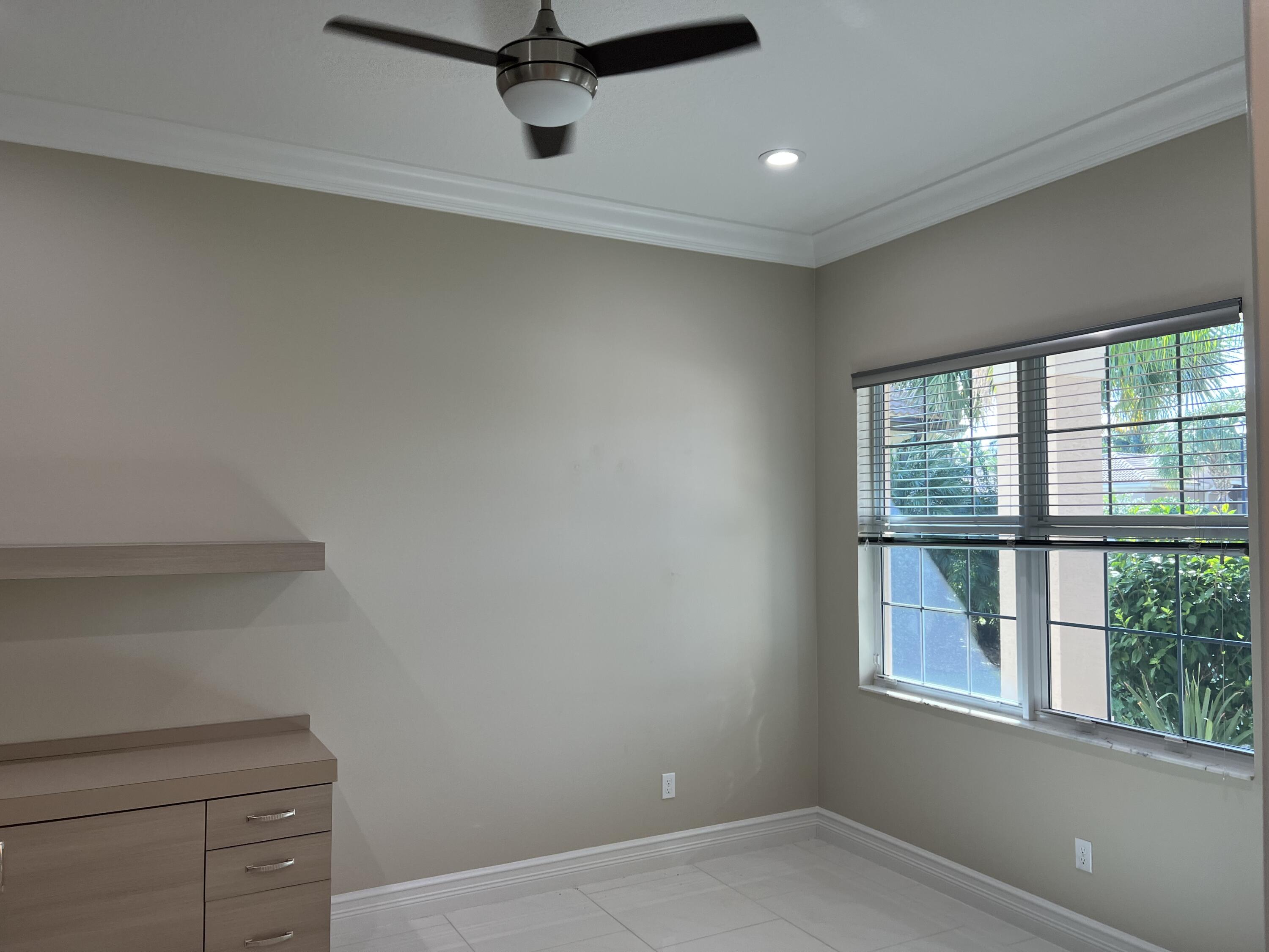 8375 Cloud Peak Drive Boynton Beach, FL 33473 - Photo 21 of 51 a view of an empty room with a window