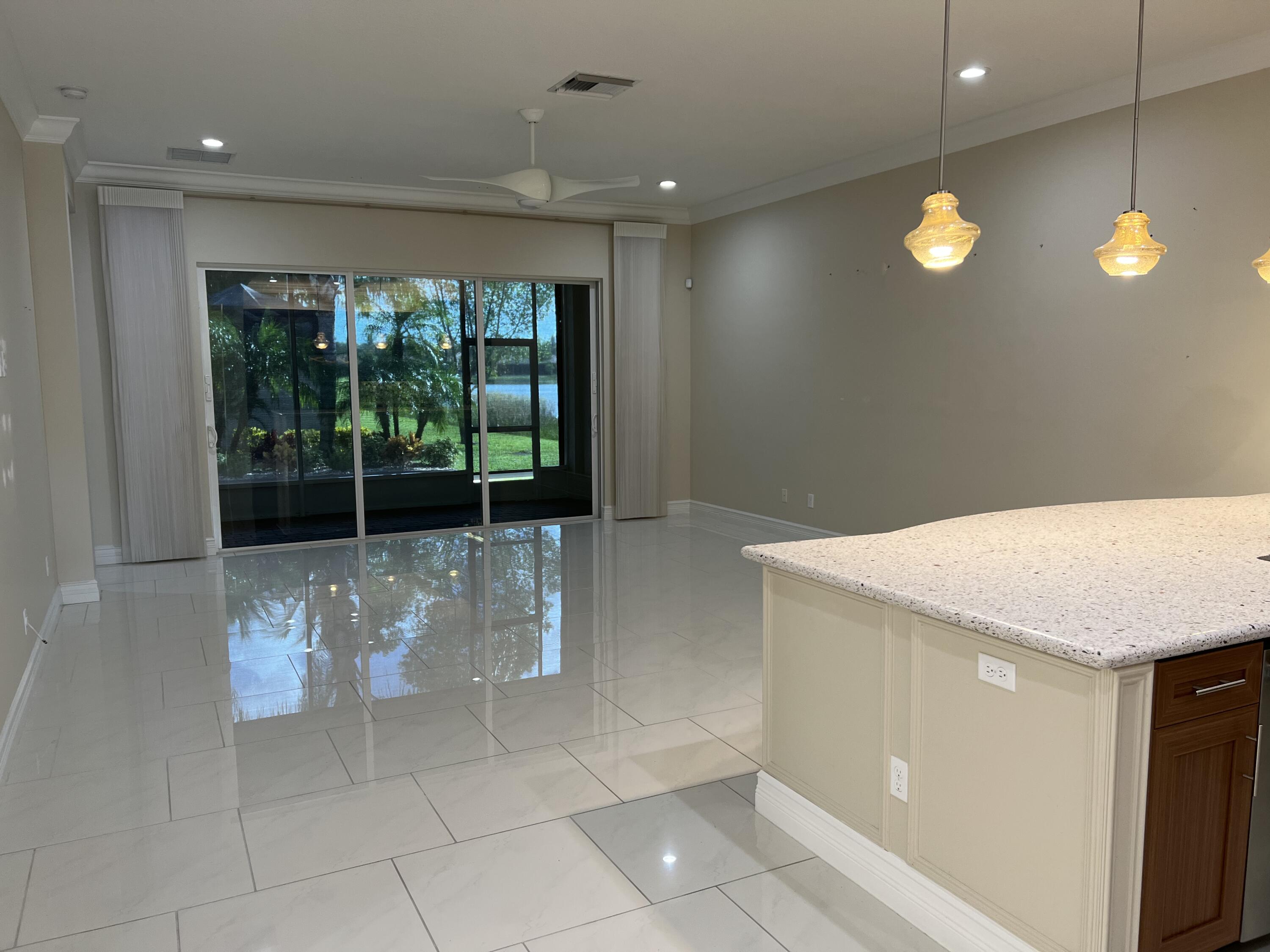 8375 Cloud Peak Drive Boynton Beach, FL 33473 - Photo 7 of 51 a view of a room with furniture and windows