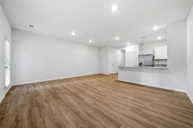 a view of kitchen with wooden floor