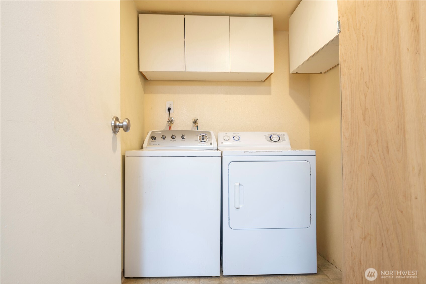 611 Southwest 5th Court, Unit A206 Renton, WA 98057 - Photo 19 of 21 a utility room with dryer and washer