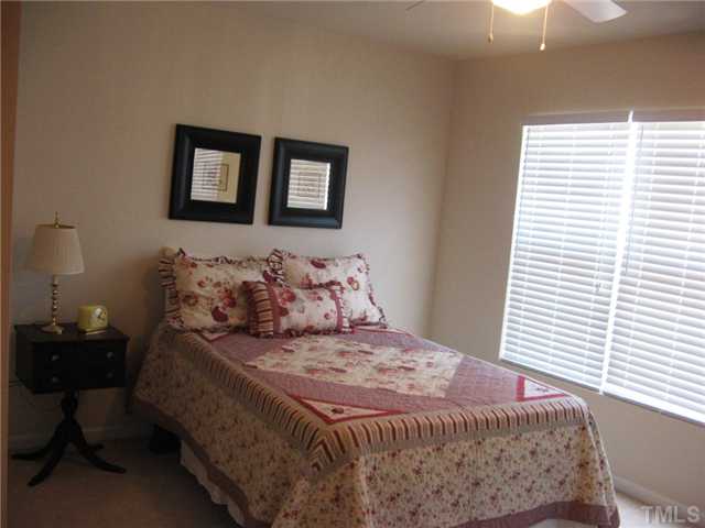 4928 Wyatt Brook Way Raleigh, NC 27609 - Photo 11 of 14 Your second master suite is set up just like the other with natural lit windows, a ceiling fan, an extended closet and its own master bathroom.