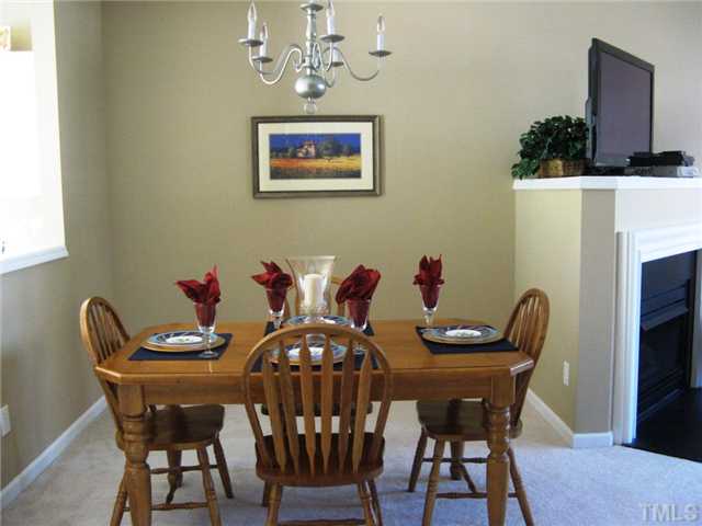 4928 Wyatt Brook Way Raleigh, NC 27609 - Photo 4 of 14 Coming up the stairs, you will first notice your lovely dining area, that is open to both the family room and the kitchen...perfect for entertaining!