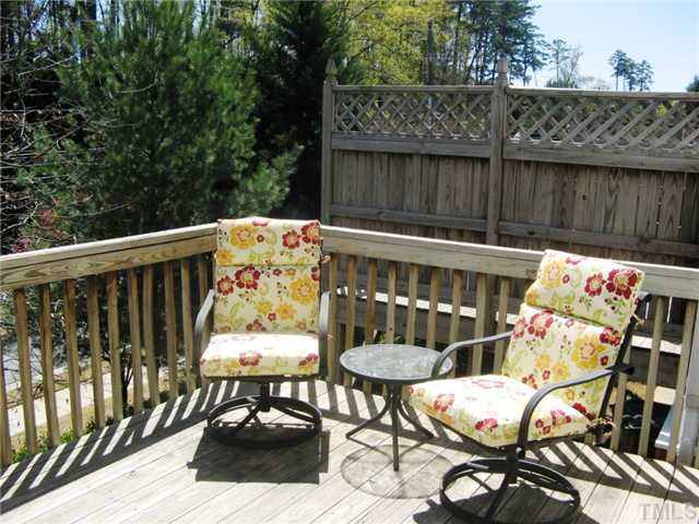 4928 Wyatt Brook Way Raleigh, NC 27609 - Photo 8 of 14 Your deck is much bigger than this picture, but it is important to take notice of the large wooden privacy screen shown here. It is on both sides of the deck allowing you your own space to relax and grill out.