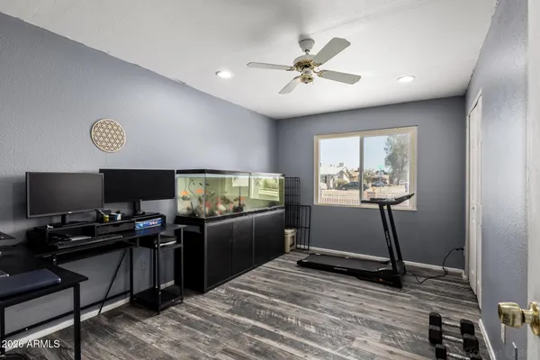 a room with furniture and flat screen tv