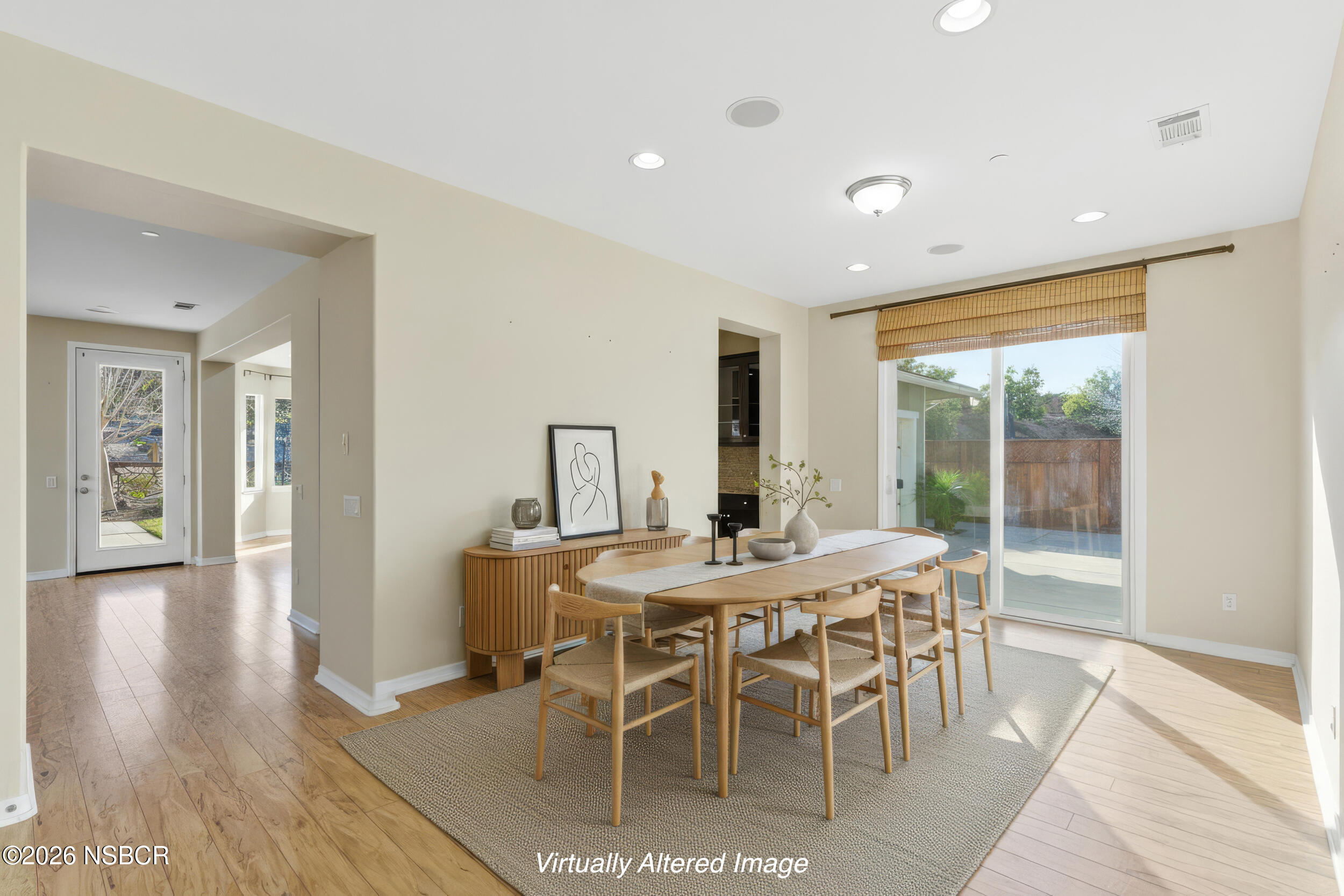 5632 Menemsha Lane Santa Maria, CA 93455 - Photo 18 of 65 a view of a dining room with furniture window and wooden floor