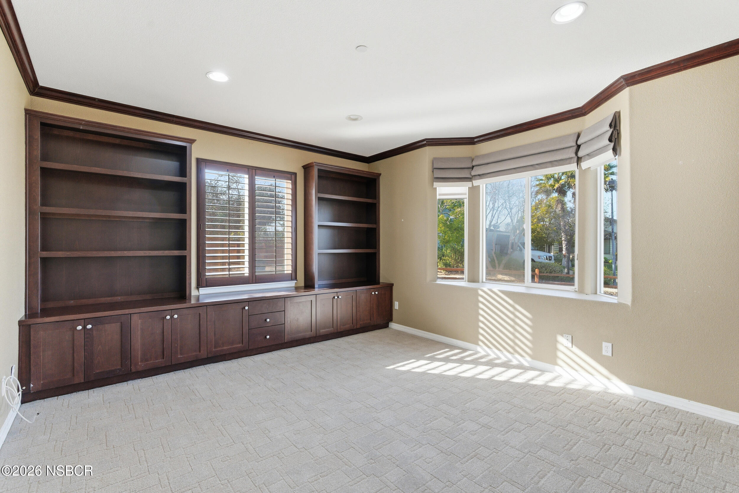 5632 Menemsha Lane Santa Maria, CA 93455 - Photo 23 of 65 a view of an empty room with a window and wooden floor