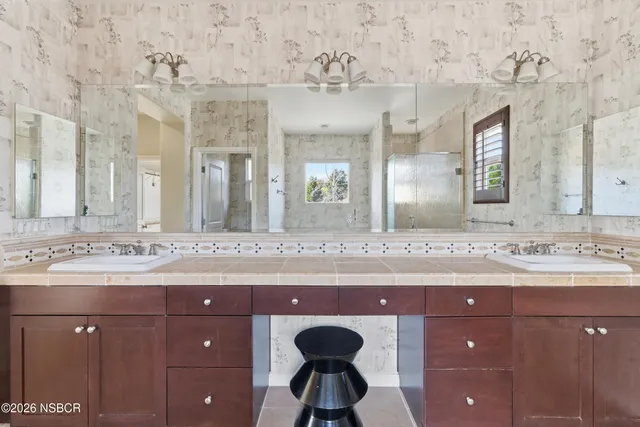 a bathroom with a bathtub and a sink