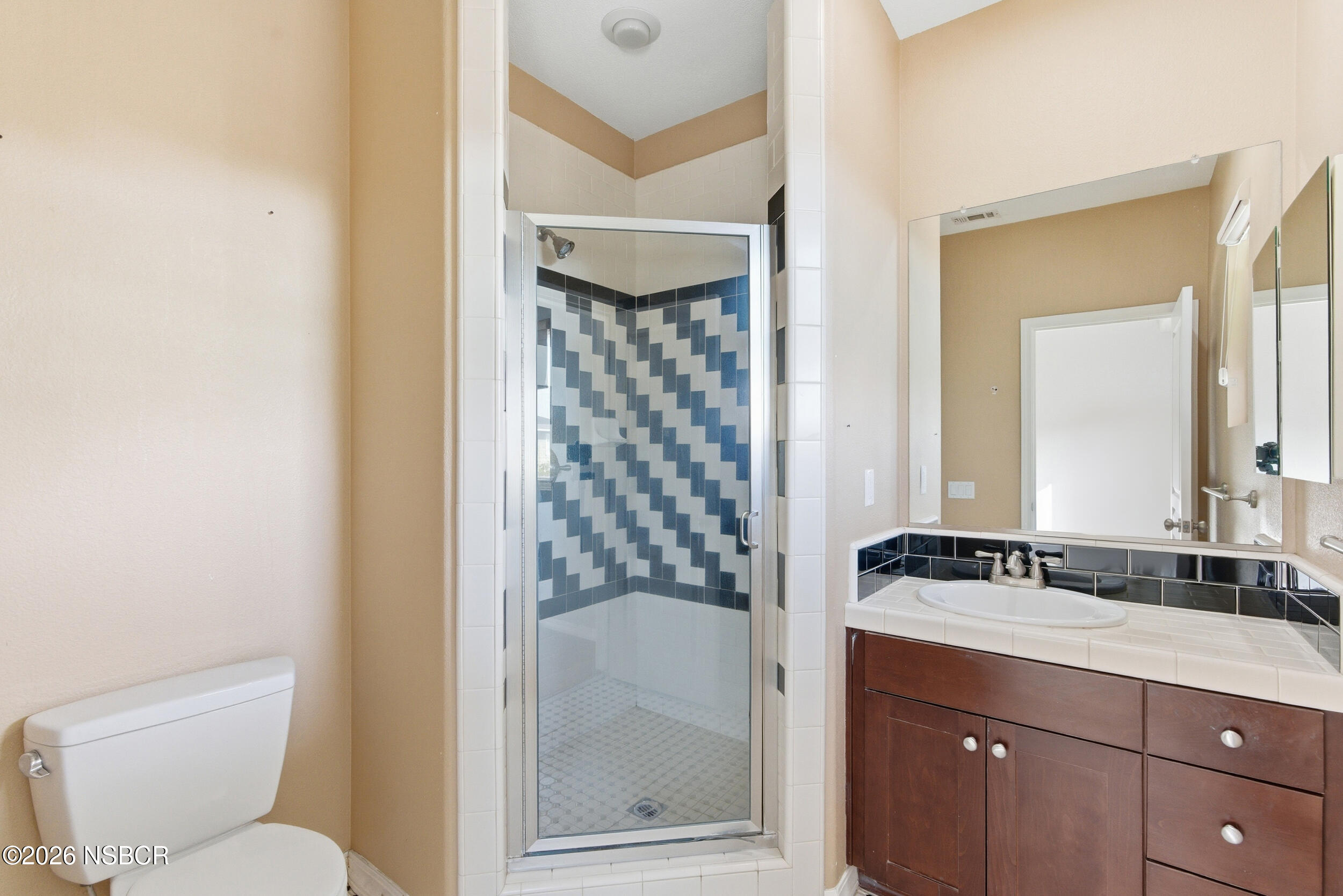 5632 Menemsha Lane Santa Maria, CA 93455 - Photo 36 of 65 a bathroom with a bathtub and a sink