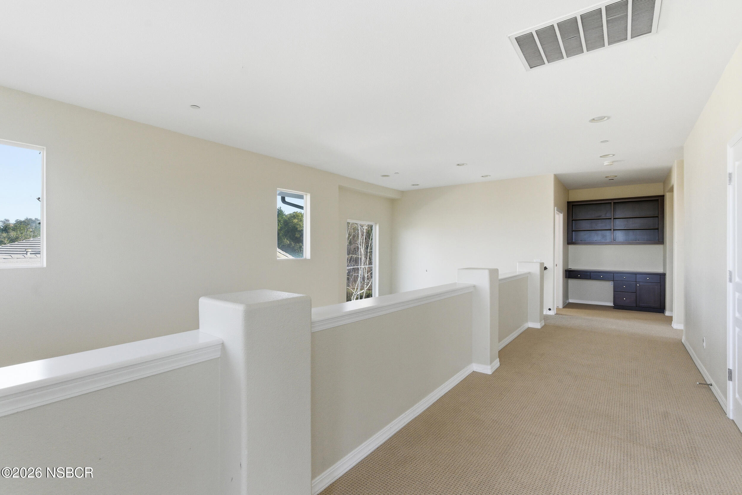 5632 Menemsha Lane Santa Maria, CA 93455 - Photo 41 of 65 a view of a kitchen with furniture and an empty room