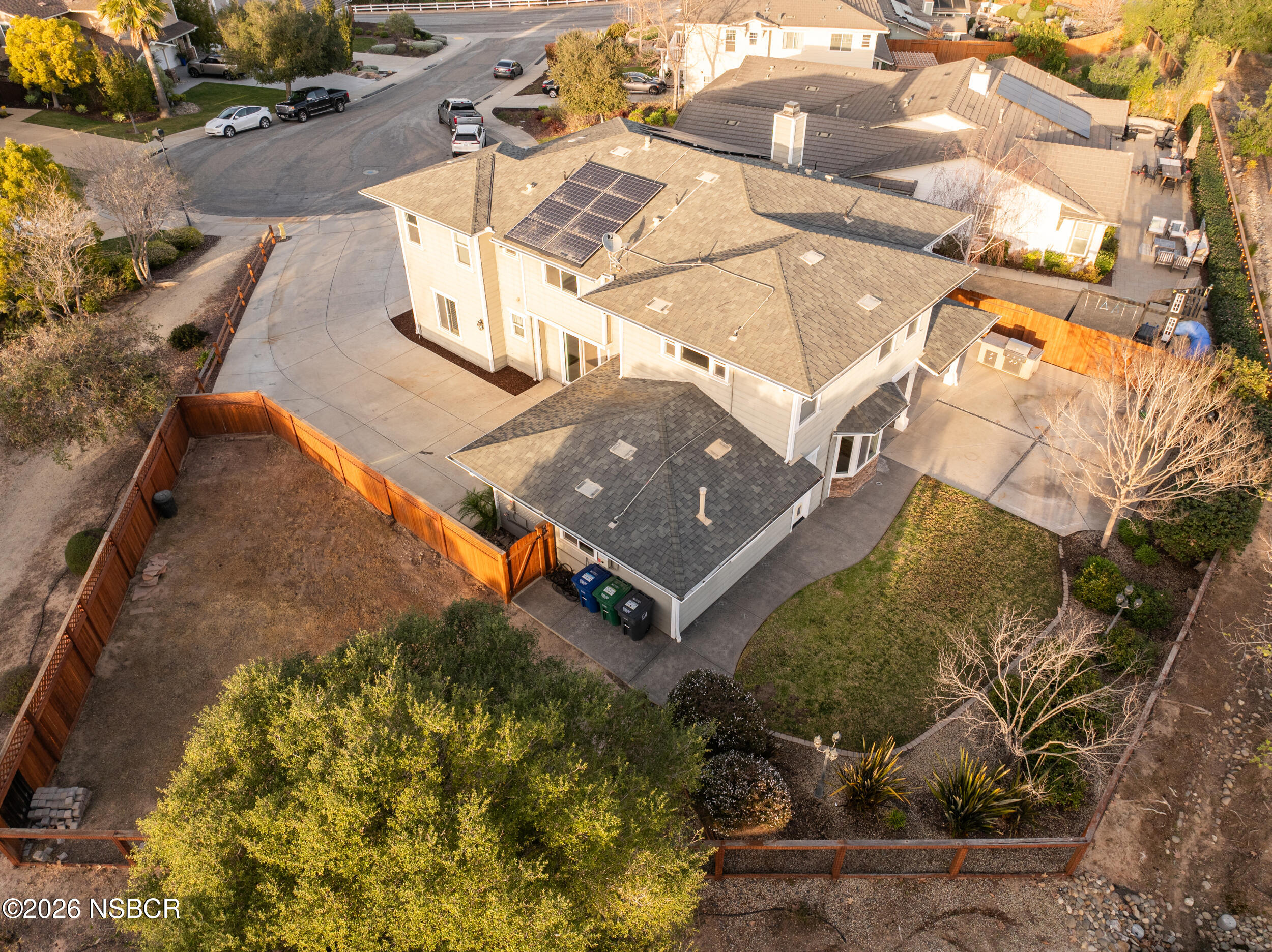 5632 Menemsha Lane Santa Maria, CA 93455 - Photo 56 of 65 an aerial view of a house with a yard and large trees
