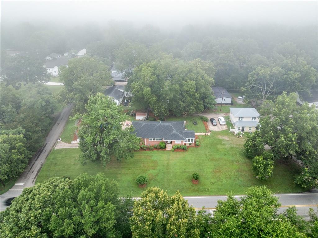 5907 Main Street Lula, GA 30554 - Photo 53 of 60 an aerial view of residential houses with outdoor space and trees