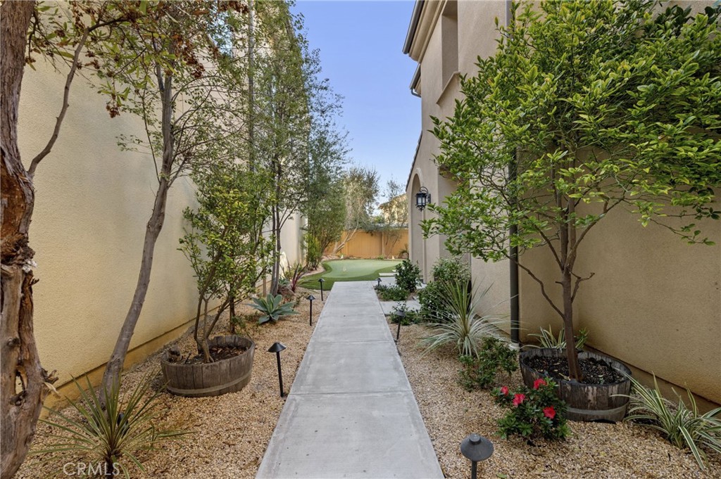 28274 Camino Del Rio San Juan Capistrano, CA 92675 - Photo 11 of 30 a view of a pathway with a flower garden