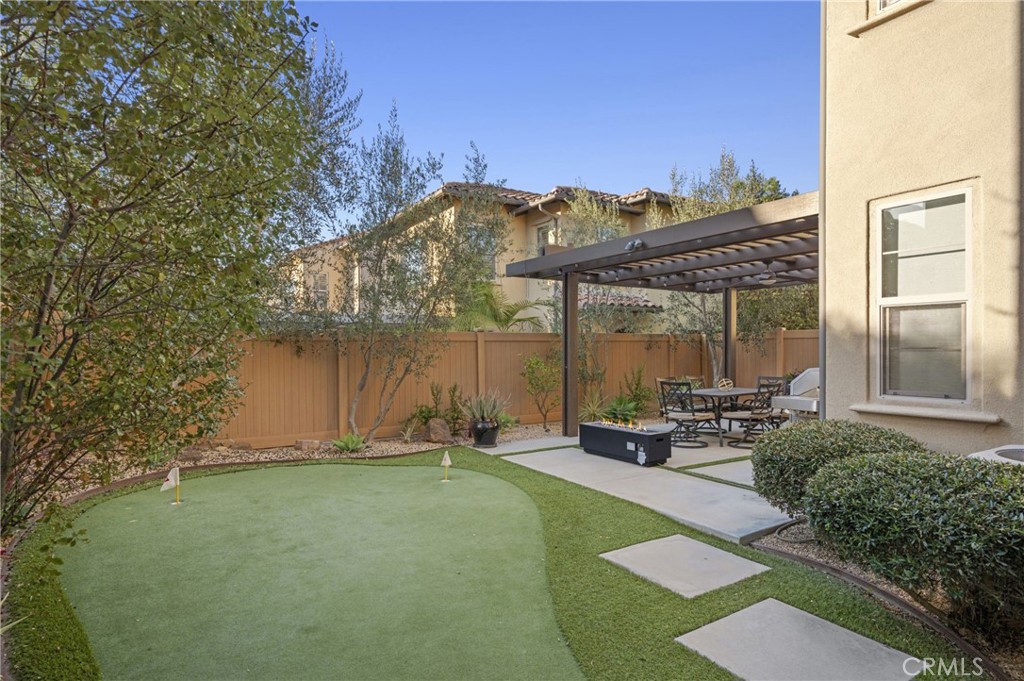 28274 Camino Del Rio San Juan Capistrano, CA 92675 - Photo 12 of 30 a backyard of a house with table and chairs