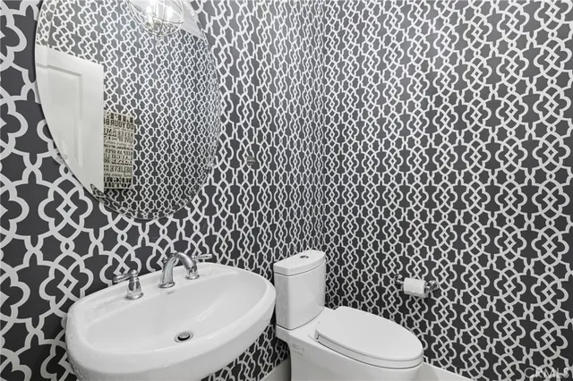 a bathroom with a sink and a toilet