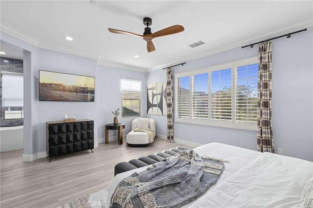 28274 Camino Del Rio San Juan Capistrano, CA 92675 - Photo 18 of 30 a bedroom with a bed couch and a window