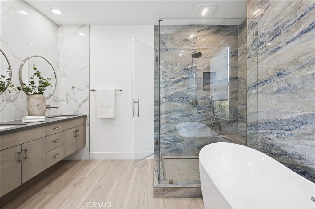 28274 Camino Del Rio San Juan Capistrano, CA 92675 - Photo 19 of 30 a bathroom with a granite countertop sink a toilet and shower