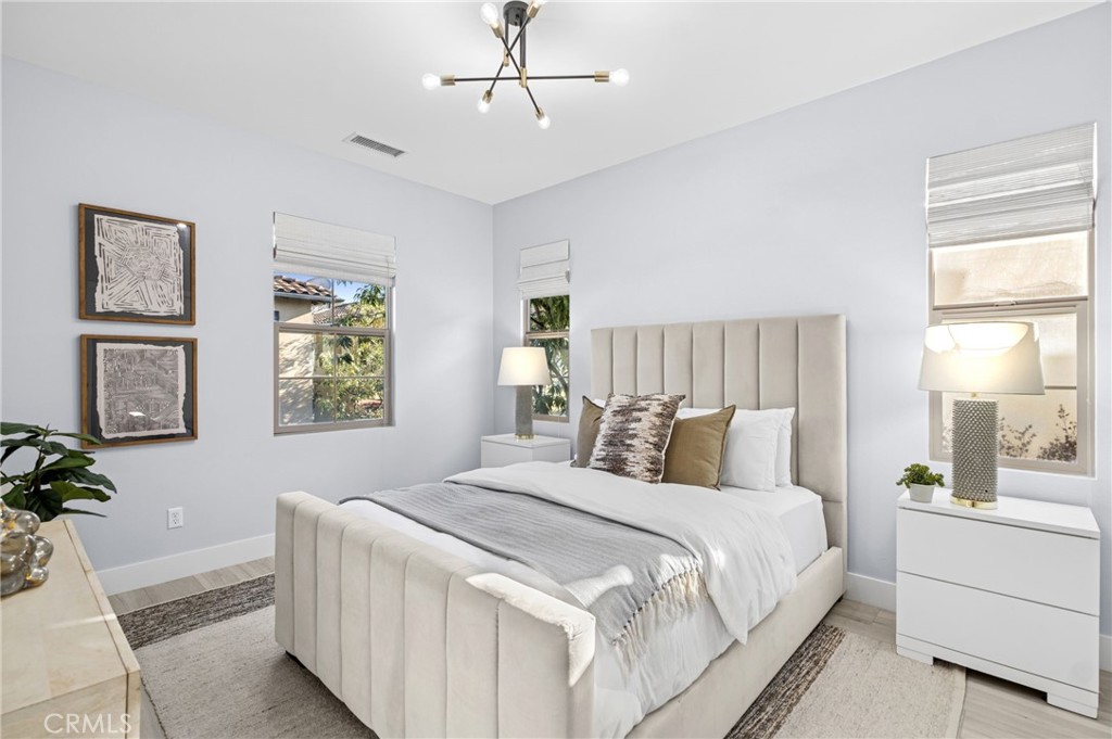 28274 Camino Del Rio San Juan Capistrano, CA 92675 - Photo 24 of 30 a bedroom with a large bed and a window