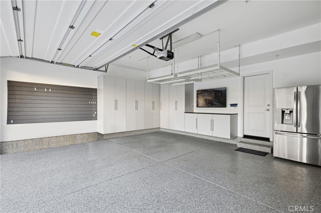 28274 Camino Del Rio San Juan Capistrano, CA 92675 - Photo 26 of 30 a view of a kitchen with a sink and a refrigerator