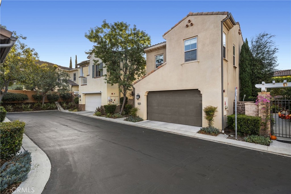 28274 Camino Del Rio San Juan Capistrano, CA 92675 - Photo 27 of 30 a front view of a house with a yard and garage