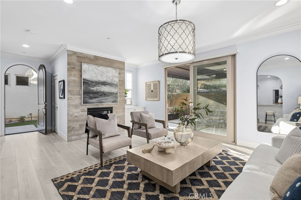 28274 Camino Del Rio San Juan Capistrano, CA 92675 - Photo 3 of 30 a living room with patio bathtub and a chandelier