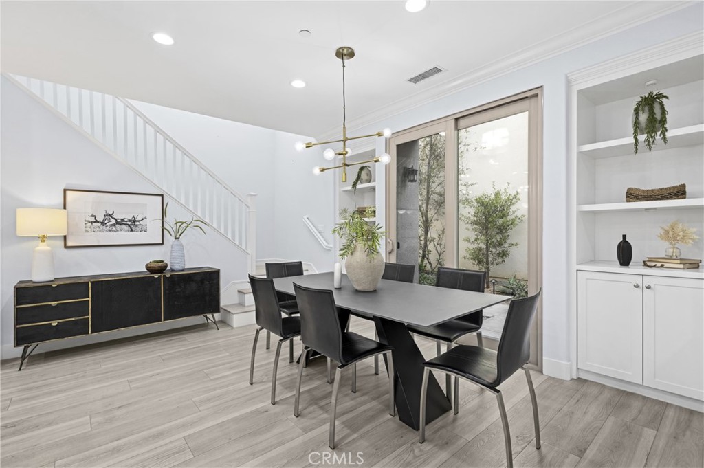 28274 Camino Del Rio San Juan Capistrano, CA 92675 - Photo 10 of 30 a view of a dining room with furniture window and wooden floor