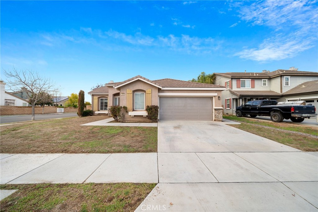 4360 Cloudywing Road Hemet, CA 92545 - Photo 1 of 1 a front view of a house with a yard
