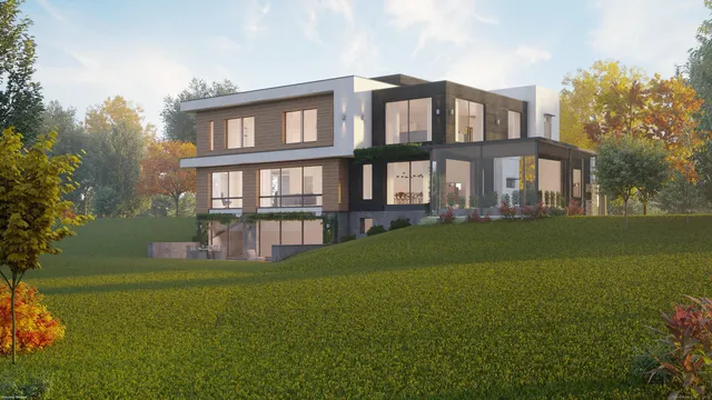 a front view of a house with a garden and yard