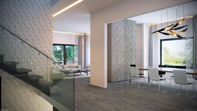 a view of an entryway with wooden floor and door