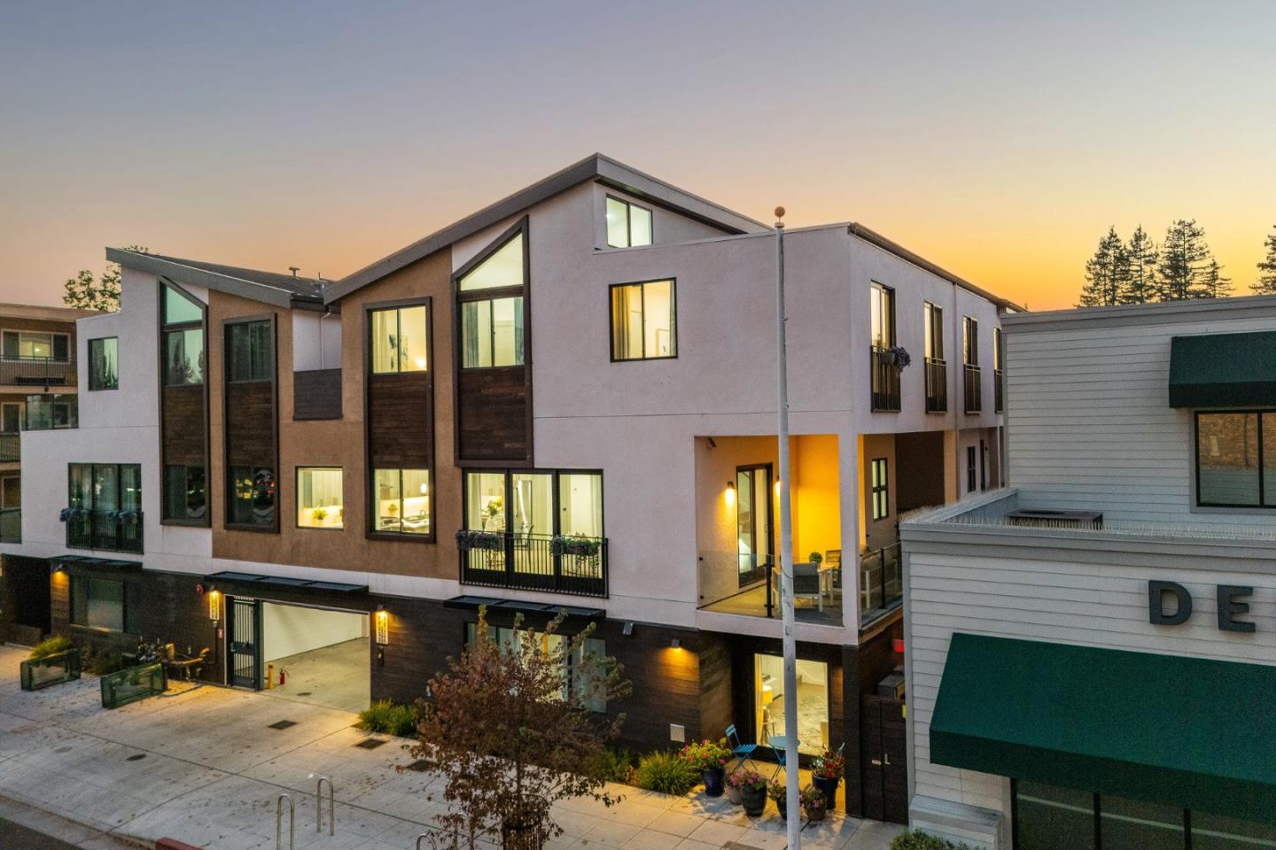 922 Woodside Road Redwood City, CA 94061 - Photo 1 of 30 a front view of a house with a yard