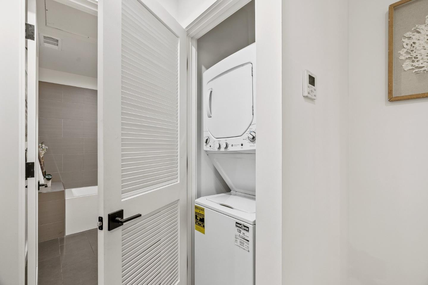 922 Woodside Road Redwood City, CA 94061 - Photo 12 of 30 a utility room with dryer and washer
