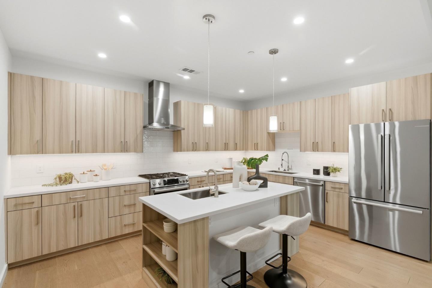 922 Woodside Road Redwood City, CA 94061 - Photo 14 of 30 a kitchen that has a lot of cabinets in it and appliances